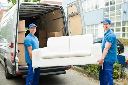 People preparing boxes for Harringay removals in a home move