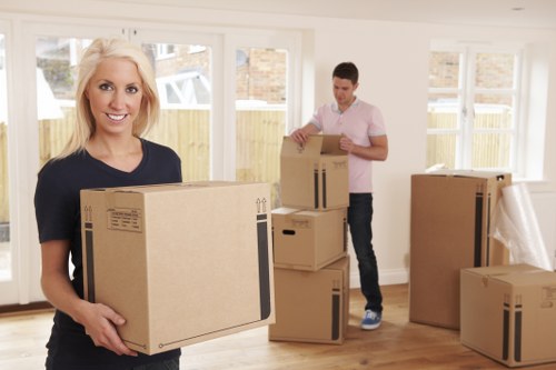 Organized relocation team coordinating a moving day in Harringay