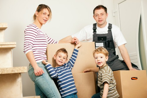 A removal van navigating a Harringay residential street during a house relocation