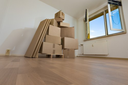 Removal team handling furniture during a Harringay relocation
