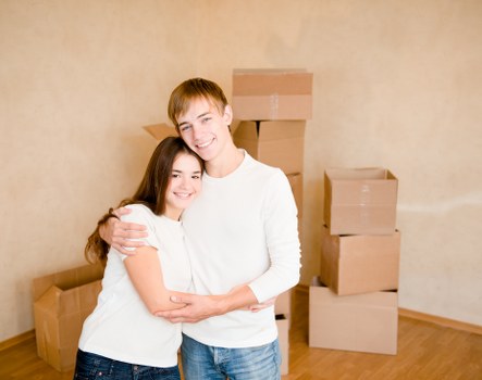 Professional movers loading household items carefully for a move in Harringay