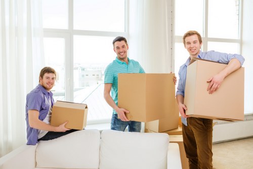 Packed moving boxes ready for flat removals in Harringay