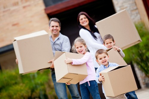 Large family move with packed boxes and furniture in Harringay
