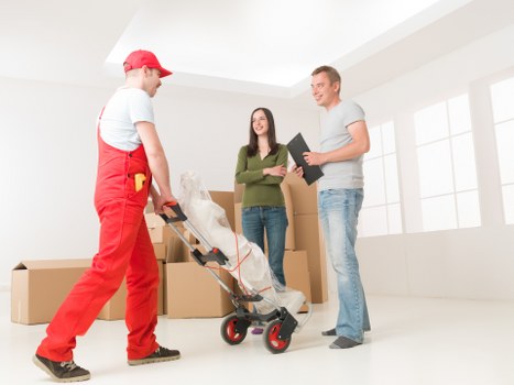 A smooth house moving day in Harringay with movers unloading items into a new home