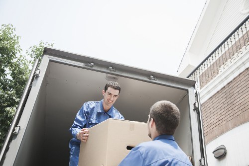 Packed moving boxes and wrapped household items for Harringay removals